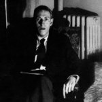 H P Lovecraft sitting