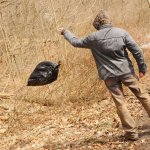 Man throwing trash