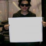 Gerard Way holding sign