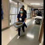 Nurse carrying poop