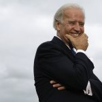 Biden Holds Back Laughter