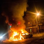 Fire burning car riots in Baltimore
