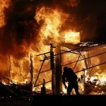 Fire burning building rioters arson