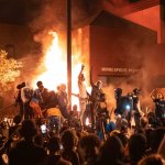 Fire burning rioters police station minneapolis