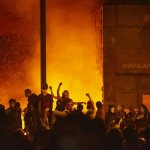 Fire burning rioting crowd Minneapolis police station 2