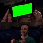 Sheldon Cooper laughing at his phone
