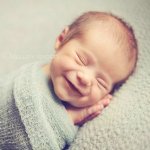 Baby sleeping smiling laughing 2