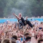 Wheelchair crowd surfing