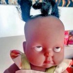 Creepy eye roll baby doll 2