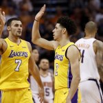 Larry Nance Jr. and Lonzo Ball slapping it up