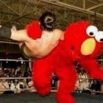 Elmo wrestling