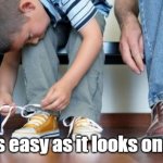 tying your shoes | It's not as easy as it looks on youtube. | image tagged in tying your shoes | made w/ Imgflip meme maker