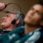 European football coach removing headphones meme