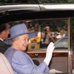 Queen in car