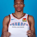 Russell Westbrook holding Sign