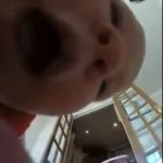 Baby eats Camera