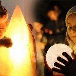 Cat hugging salt lamp and girl with moon ball