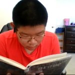 asian guy reading