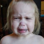 Crying toddler snot bubble