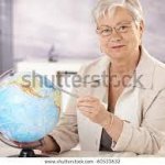lady pointing at globe