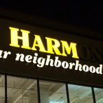 Harm Your Neighborhood Grocer Sign