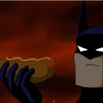 Batman eats a Hotdog