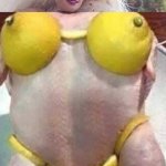 Raw chicken with doll head and lemon bikini