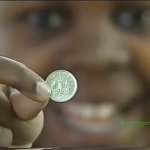 That creepy face behind the coin
