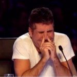 simon trying not to laugh