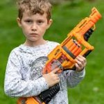 Kid with nerf gun