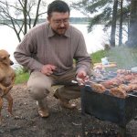 Dog helps barbeque