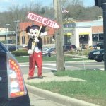 MICKEY MOUSE AND SIGN "YOU'RE NEXT"