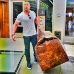 The Rock Carrying Giant Bag meme