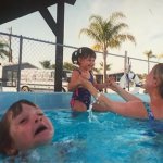 Kid drowning in pool while mother ignores him