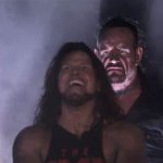 Undertaker behind Aj Styles