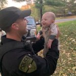 Cop with infant