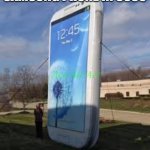 bigass phone | SAMSUNG PHONE IN 3030 | image tagged in bigass phone | made w/ Imgflip meme maker
