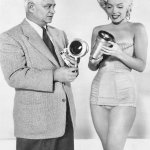 Marilyn Monroe and special effects artist Sol Halperin promoting