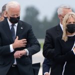 Biden checking his watch as hero’s body’s are unloaded