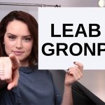 Daisy Ridley with a blank sign pointing at you (tilt corrected) | LEAB; GRONP | image tagged in daisy ridley with a blank sign pointing at you tilt corrected | made w/ Imgflip meme maker