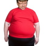 Michael Moore red shirt black shorts