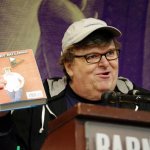 Michael Moore with book