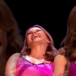 Kylie Minogue laughing manaically