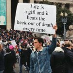 Life is a gift and it beats the heck out of death every time. ;) | Life is a gift and it beats the heck out of death 
every time. | image tagged in man holding sign,memes,funny memes,life lessons,life,philosophy | made w/ Imgflip meme maker