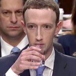 Mark Zuckerberg drinking
