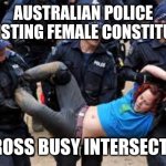 AUSTRALIAN FEMALE ASSIST | AUSTRALIAN POLICE ASSISTING FEMALE CONSTITUENT ACROSS BUSY INTERSECTION | image tagged in australian police,funny memes | made w/ Imgflip meme maker