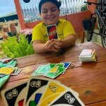 Excited child with one uno card