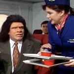 Unfrozen Caveman Lawyer on plane