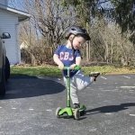 Little boy on scooter