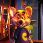 yea,everybody knows its a surprise when your parents say your going to a fun place. | WHEN UR STARING AT SOMETHING BUT MOM DISTURBS YOU AND SAYS; YOU CAN GO TO PIZZA TIME THEATRE | image tagged in chuck e cheese | made w/ Imgflip meme maker